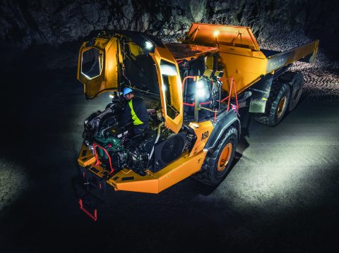 mechanic performing heavy equipment maintenance