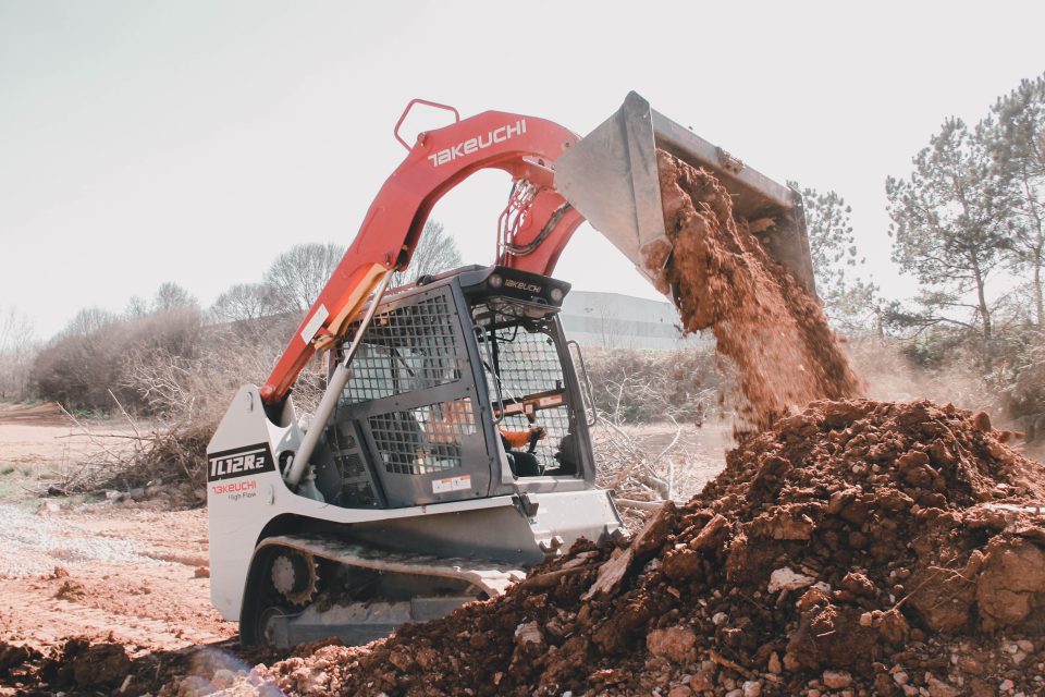 Tracked small loader illustrating total cost of ownership