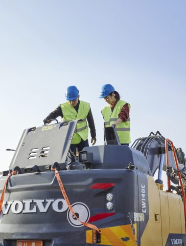 service techs preparing heavy equipment for peak construction season