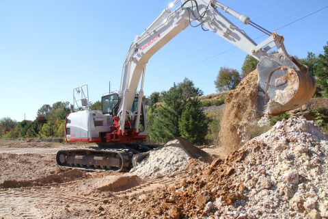 Takeuchi excavator at a work site
