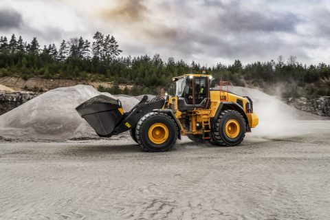 construction worker operating a wheel loader